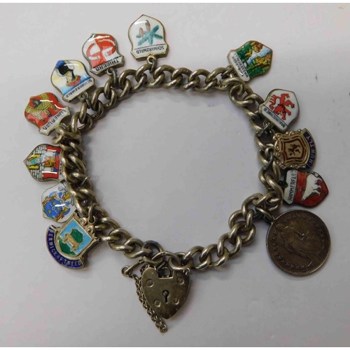 287 - 925 silver and enamel charm bracelet