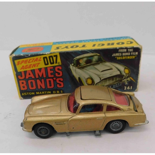 714 - Corgi James Bond Aston martin with both figures and original box