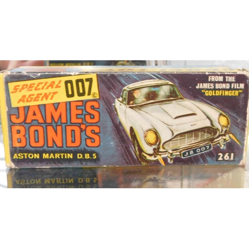 714 - Corgi James Bond Aston martin with both figures and original box