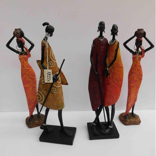 51 - Four - African style figures