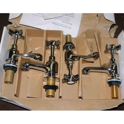 698 - Four boxed bath and sink taps