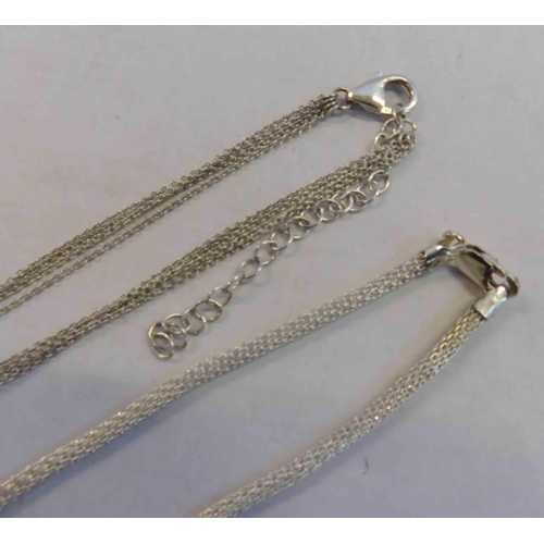 220 - Two - silver necklaces