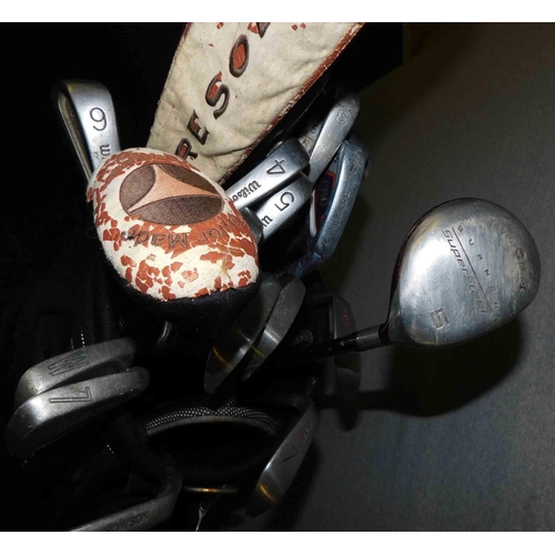 650 - Golf bag and selection of clubs