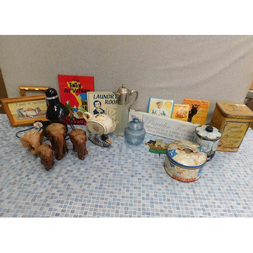 678 - Box of mixed collectables incl. treen elephants, repro enamel signs and vintage tins