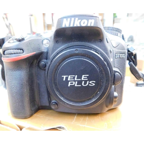 795 - Nikon D7100wk inc battery, charger motordrive w/o