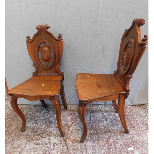 558 - Pair of Victorian Armorial chairs