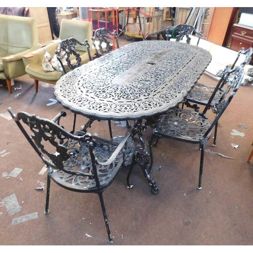 757 - Large cast garden table and 6x chairs