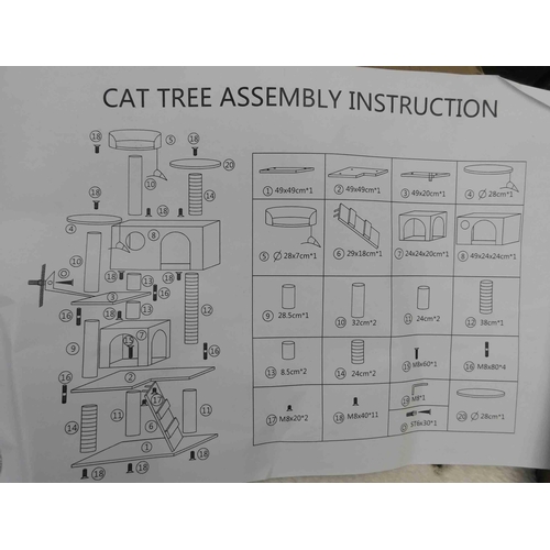 770 - Boxed large cat tree (new) + dog coat for medium dog-new