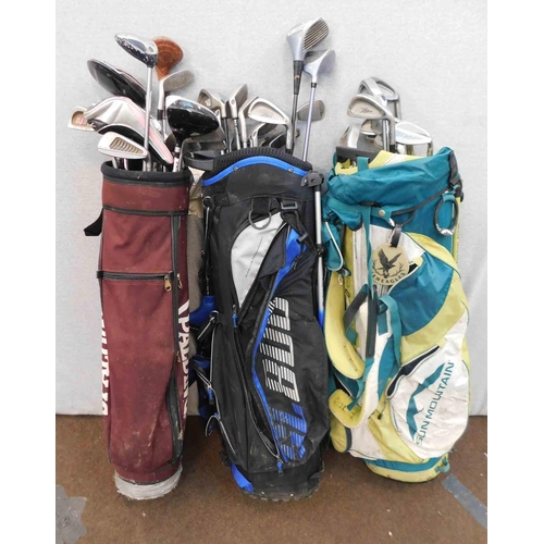 810 - Three sets of golf clubs with bags