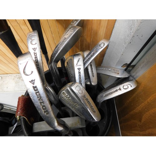 708 - Dunlop vintage golf clubs in caddy