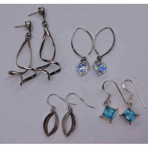 138 - Four - pairs of silver earrings