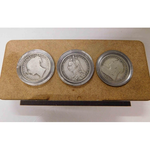 262 - Three - Victorian silver Shilling coins