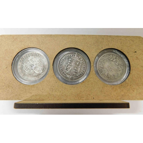 262 - Three - Victorian silver Shilling coins