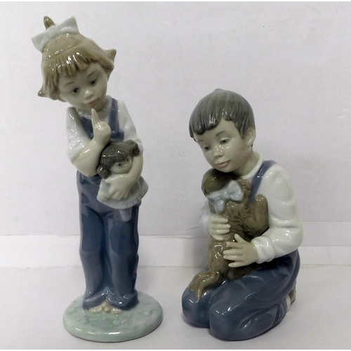 133 - Two Nao figures - Forever friends 1127 - & Girl holding doll - no damage