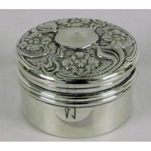 41 - Sterling silver - pill box with repousse decoration