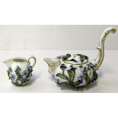 43 - Meissen - small teapot & jug - crossed swords mark from 1815 - slight wear to leaves, iris flowers e... 