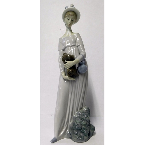 61 - Lladro - Looking at her dog Model No. 4994 - retired 29cm tall - no damage