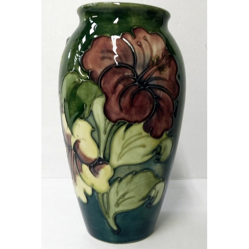 94 - Moorcroft - Hibiscus on green ground vase - 18.5cm tall  signed to base - no damage