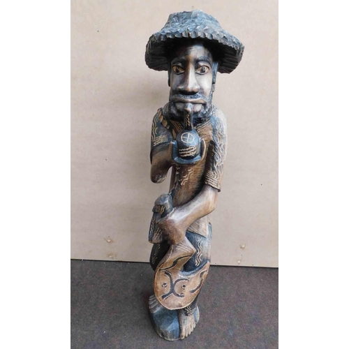 1 - Hand carved - Caribbean figure approx 35