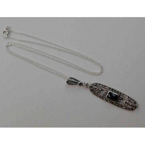 134 - Silver/jet & marcasite - pendant on silver chain