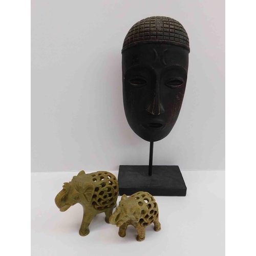 14 - Wooden mask on plinth - & two soapstone elephants