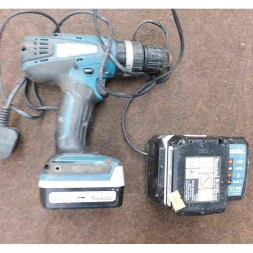 502 - Makita 14.4 cordless drill, 2x batteries & charger-unchecked