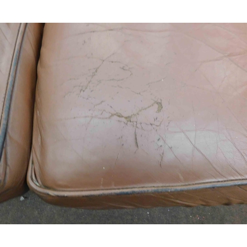 560 - Three piece leather Chesterfield sofa - castors at fault