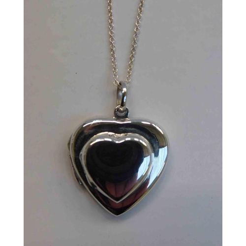 107 - Silver heart locket on silver chain