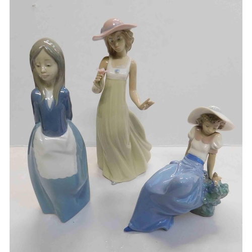 111 - Three - Nao figurines
