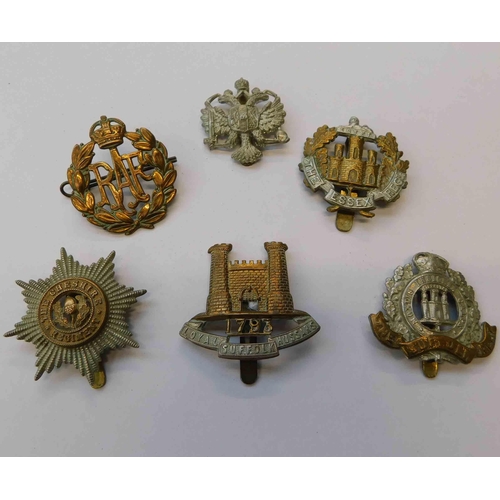 150 - Six - Regimental cap badges