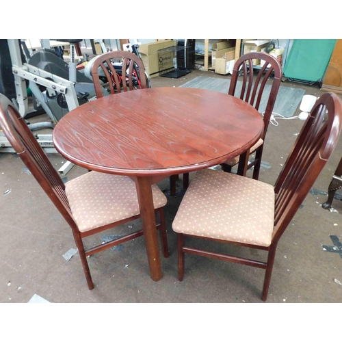 549 - Circular extending dark wood table with 4x chairs