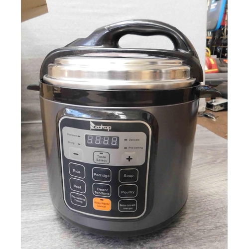 610 - Electric pressure cooker W/O - new and boxed