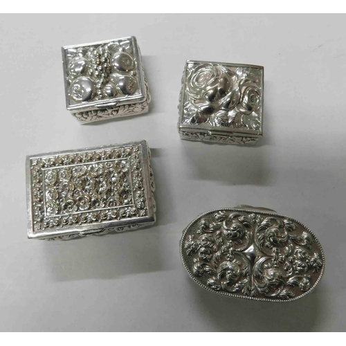 148 - Four - repousse decorated/white metal - pill boxes