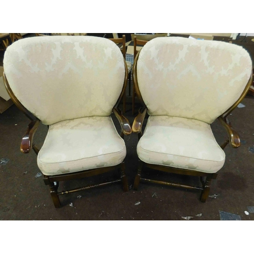 557 - Pair of Ercol style wooden armchairs