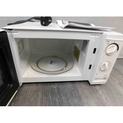 578 - Tesco basic microwave in W/O with instructions