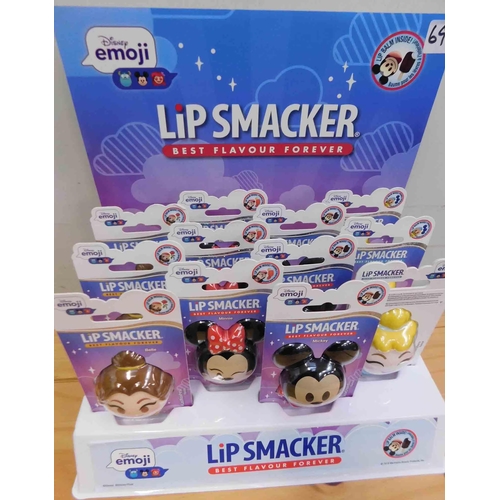 605 - Display stand and contents (12) Disney Emoji lip smacker lip balms - 4 flavours