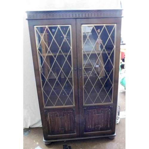 614 - Oak with leaded glass display cabinet