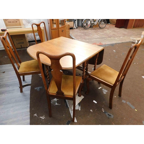 617 - Oak drop leaf table + 4 chairs