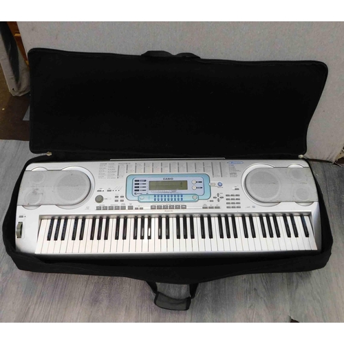 652 - Casio keyboard in bag - WK3000