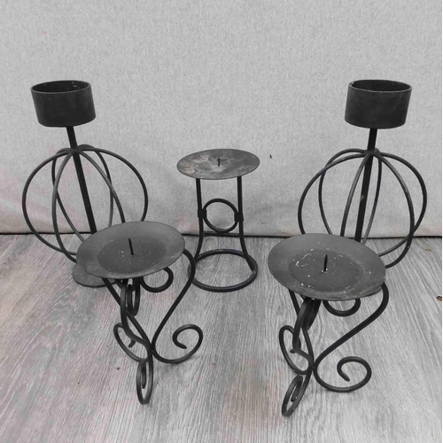 664 - 5x Metal church candle stands