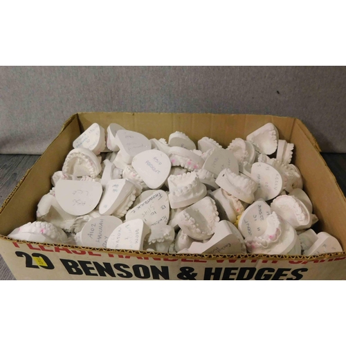 677 - Box of plaster cast teeth