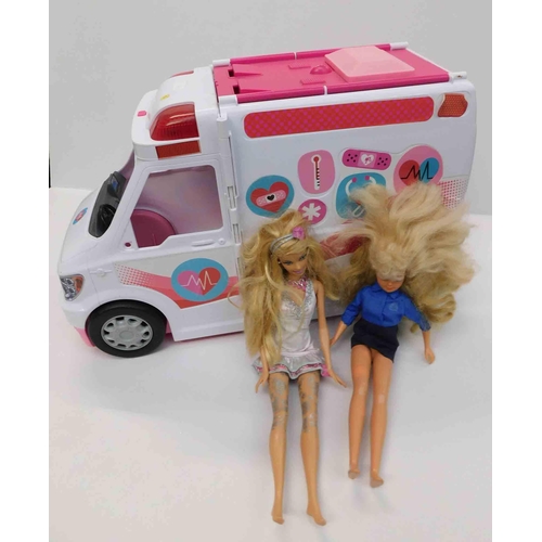 691 - Barbie camper van + 2x Barbie dolls