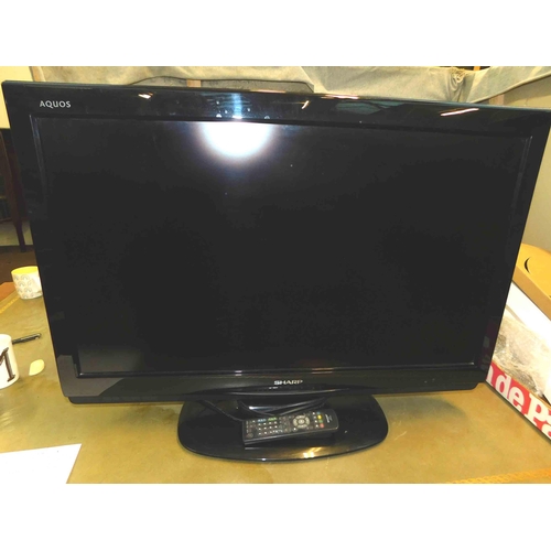 745 - Sharp Aquos TV with remote in W/O