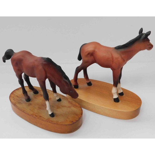 15 - Two - Beswick horses on plinths...