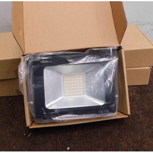 521 - 5x New and boxed Tycolit small LED wall lights