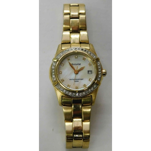 152 - Ladies - Accurist water resistant - pearl face/gem set watch