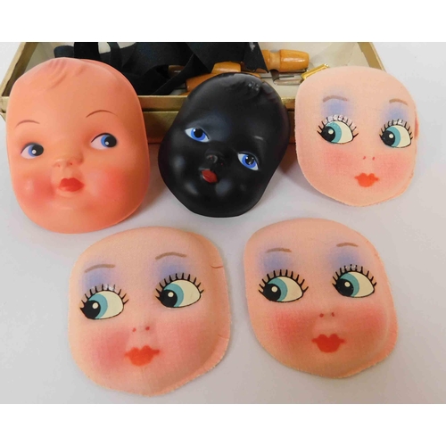 158 - Moulded doll faces