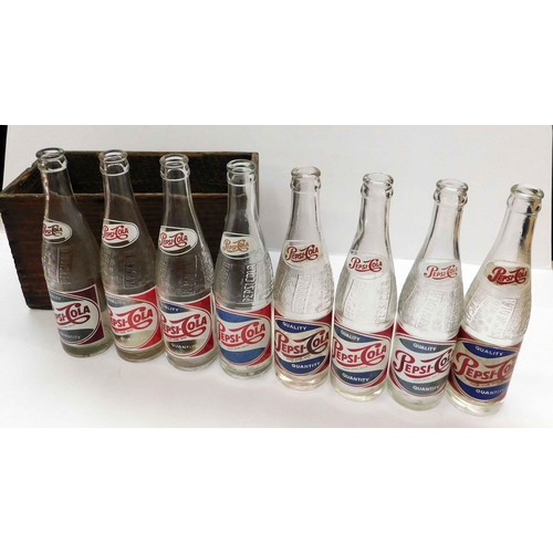 195 - Eight - Pepsi Cola bottles in wooden crate