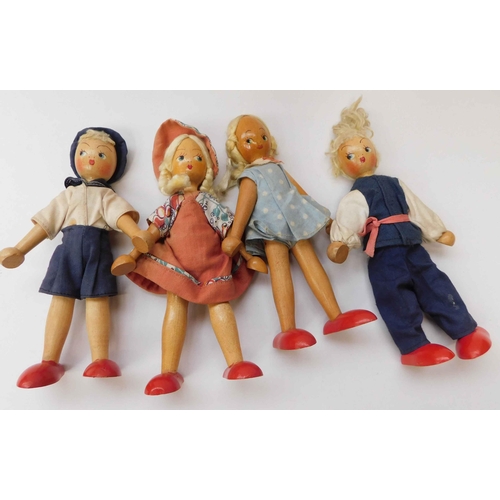 218 - Four - vintage wooden dolls