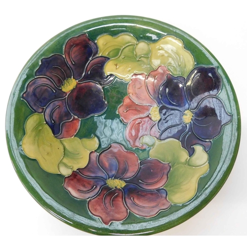 244 - Moorcroft - Clematis pattern - on green ground bowl 25cm diameter - signed with paper label